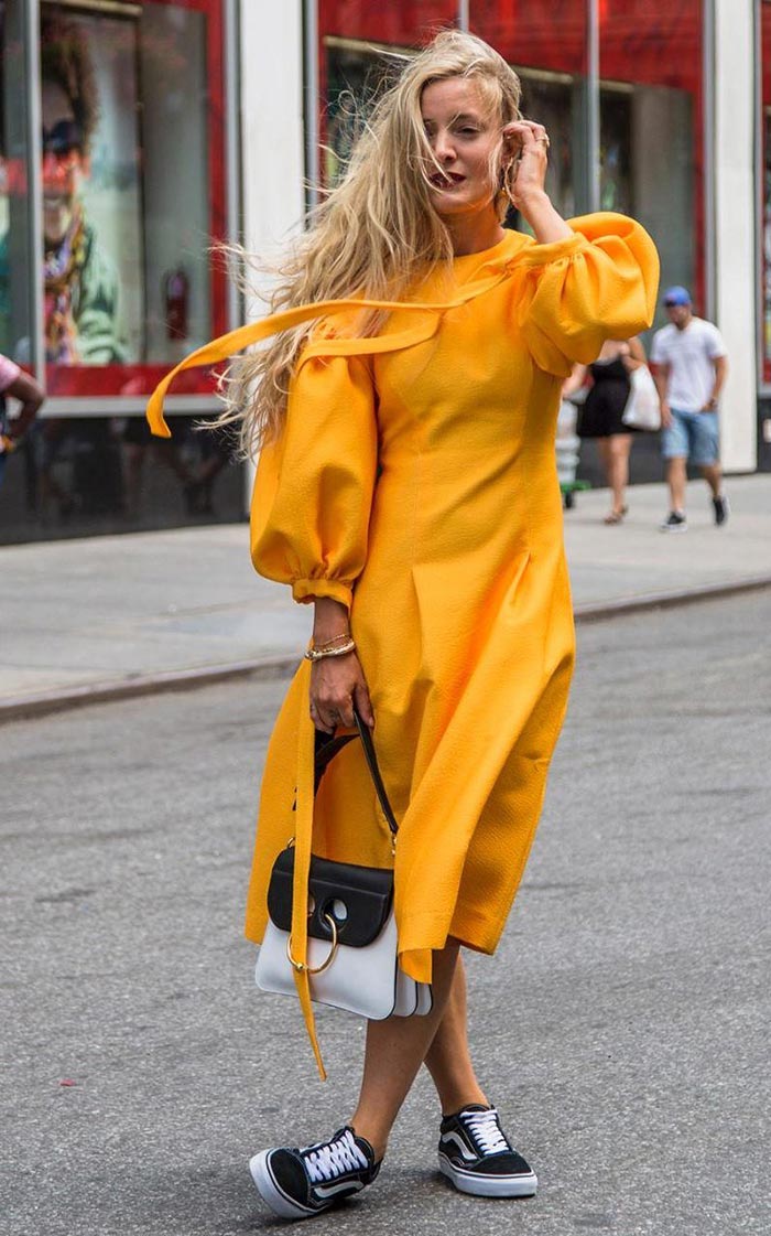 Kate Foley wearing puff-sleeve dress